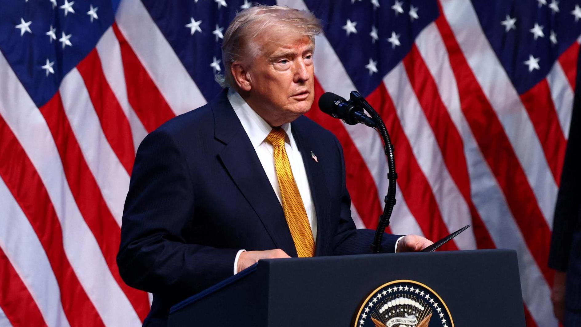 Trump threatens Iran and says truce is over, as Iranian official warns of regional retaliation