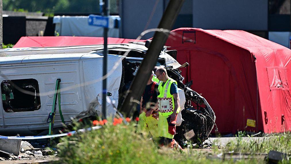 Several killed as train and school bus collide in Belgium, local media report