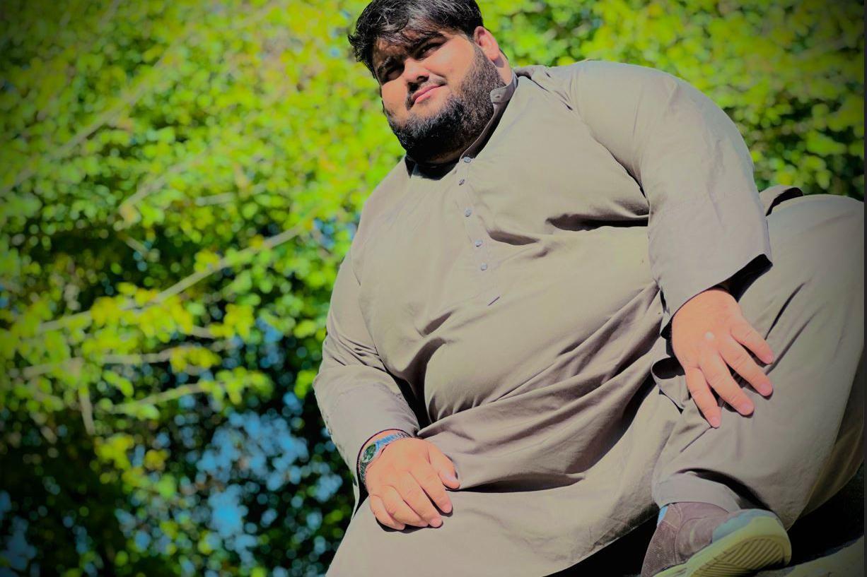 Qudratullah looking at the camera