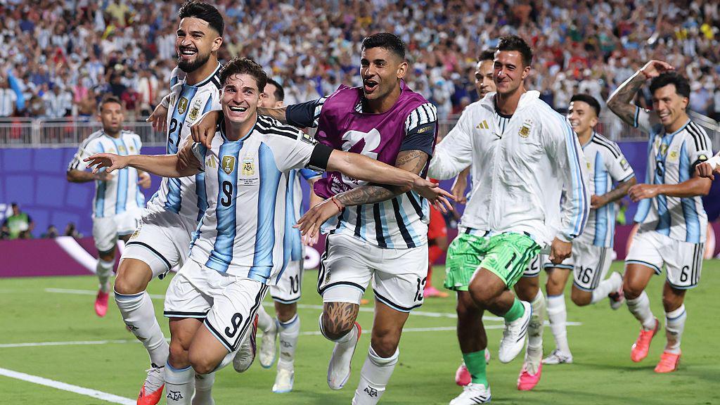 Argentina beat 10-man Switzerland in extra time to set up England tie