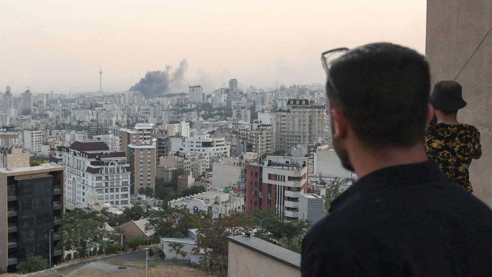 Israel and Iran trade strikes as Trump says he wants 'real end' to conflict