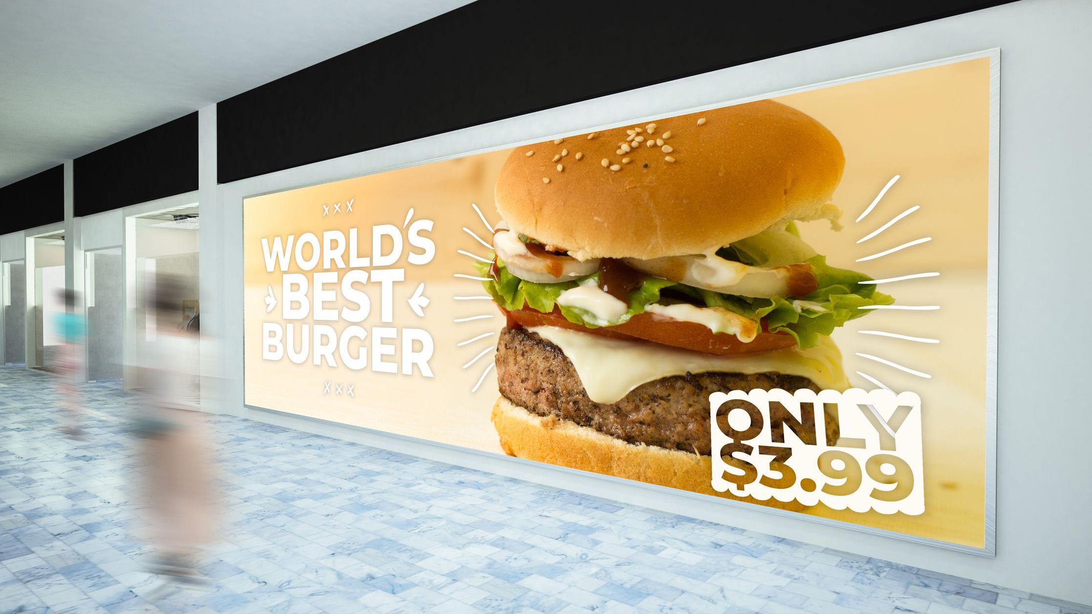 Cartaz anunciando hamb&uacute;rguer em local p&uacute;blico