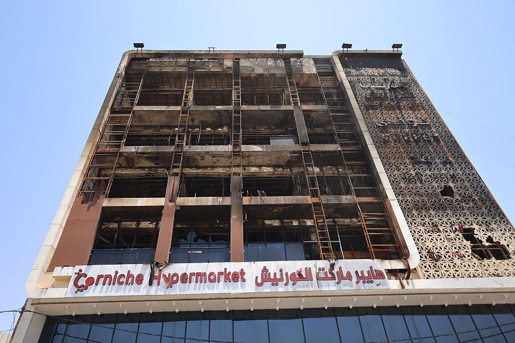 Iraqs shopping centre fire leaves 61 dead, many missing