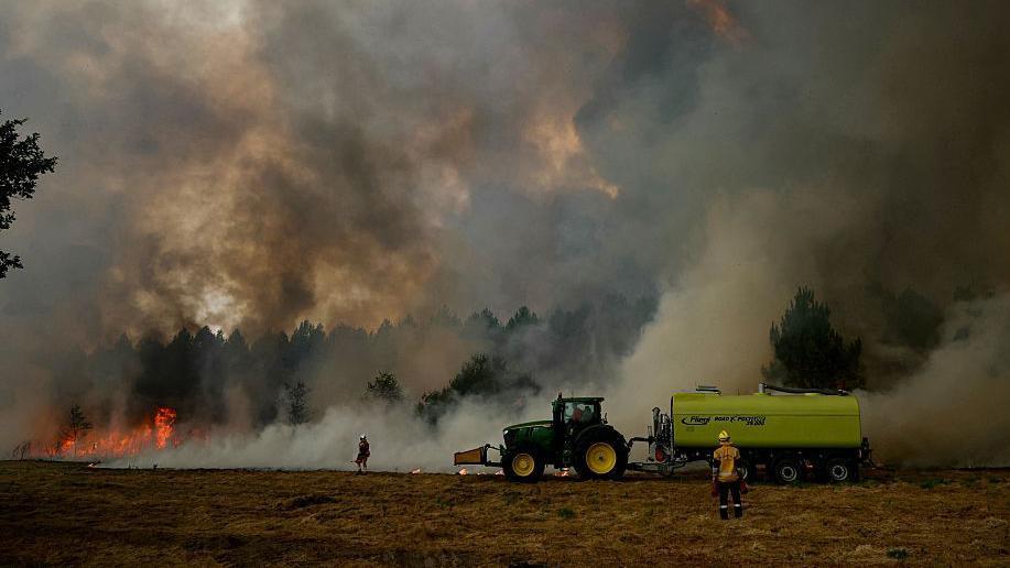 Firefighters battle wildfire as tens of thousands evacuated near Bordeaux