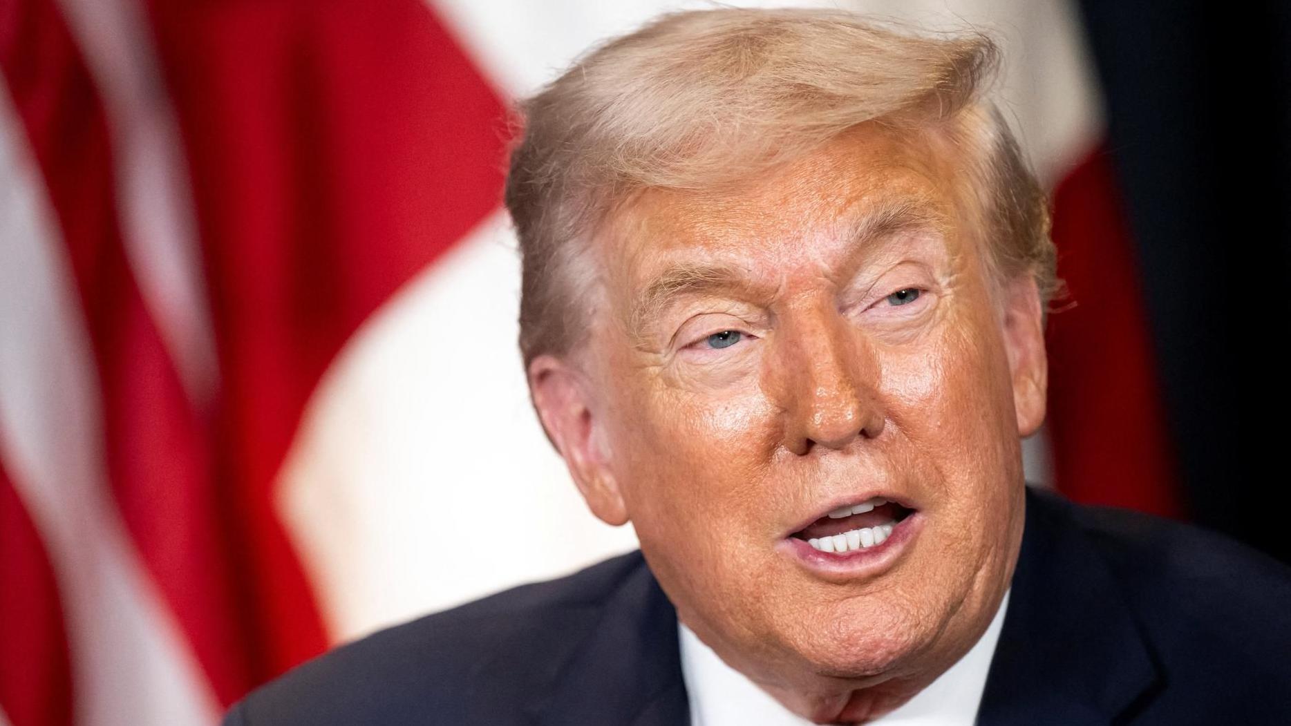 Trump rules out taking Greenland by force but seeks 'immediate negotiations' to acquire island