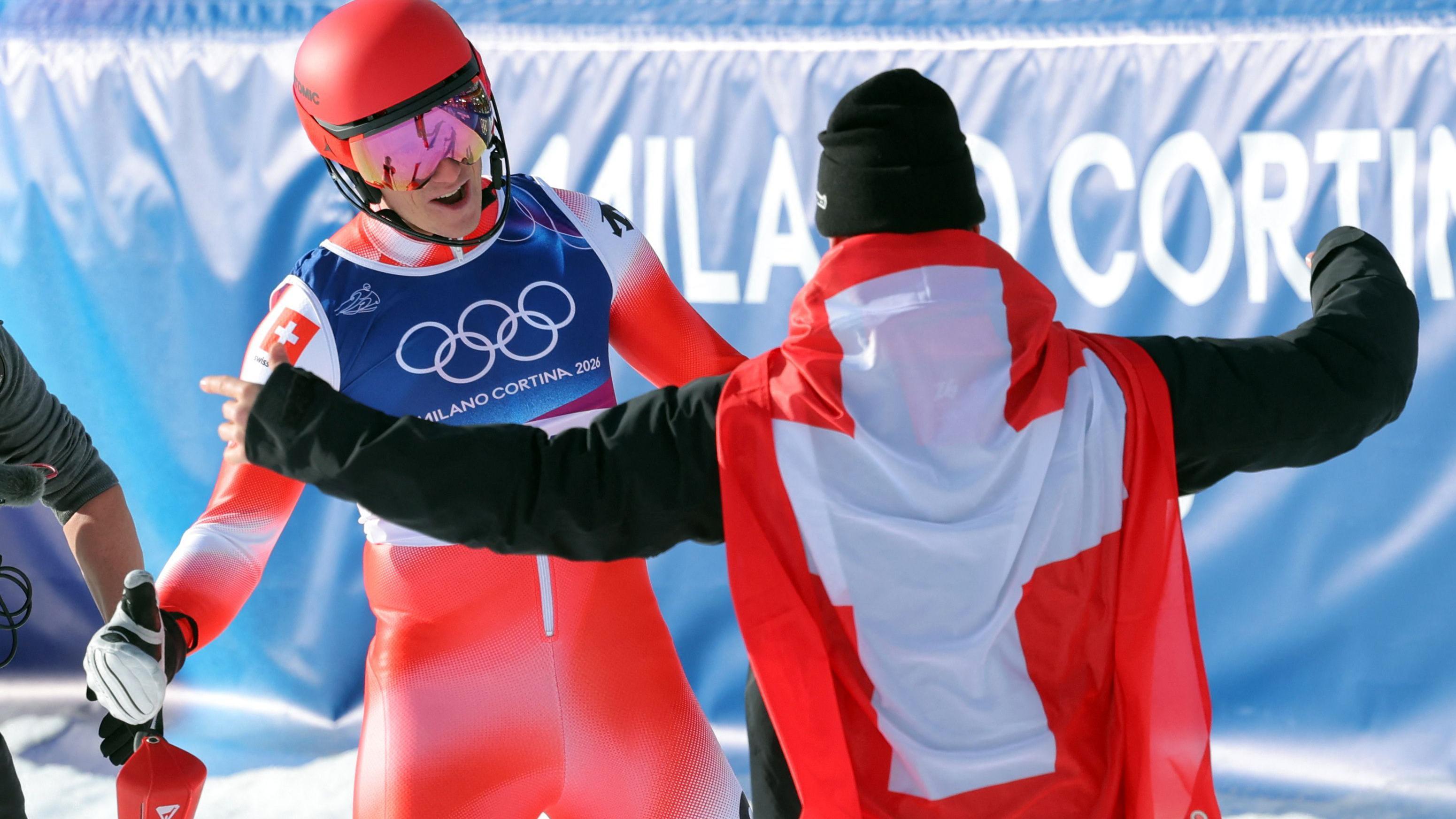 Winter Olympics: Switzerland win gold in new team alpine skiing event - watch