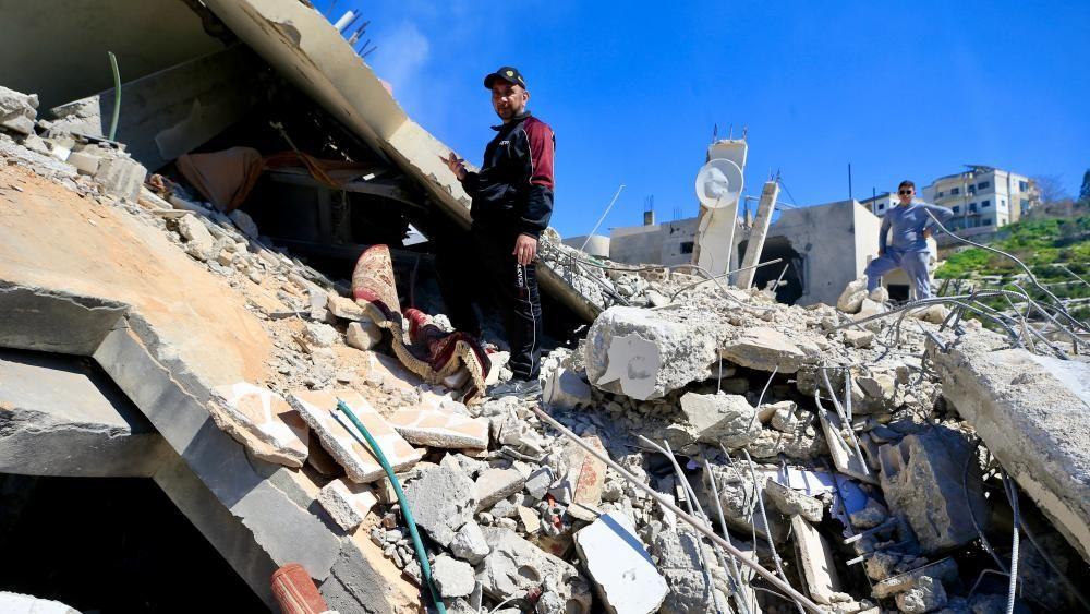 Lebanon says nearly 400 killed in Israeli strikes as US urges Iranians to 'stay at home'