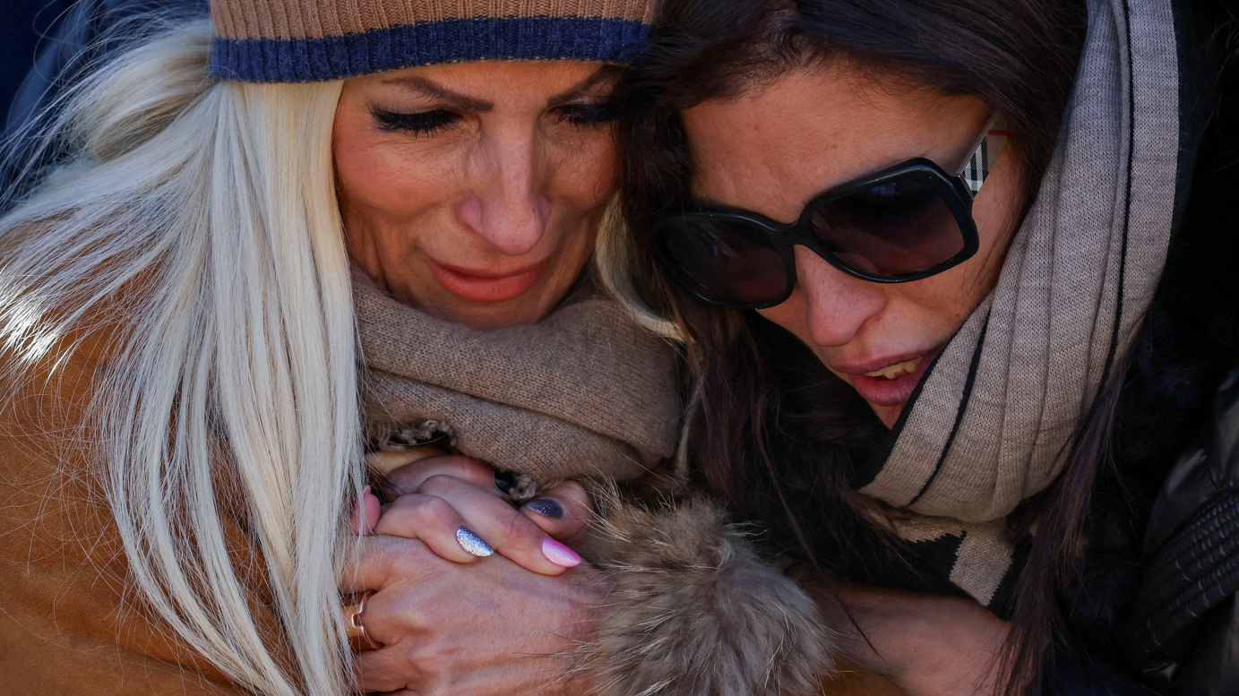 Raw emotions as mourners attend Mass for Swiss bar fire victims