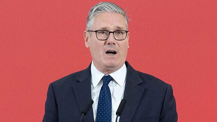 Starmer announces extra £15bn for defence, with some road and energy projects scrapped to help fund it