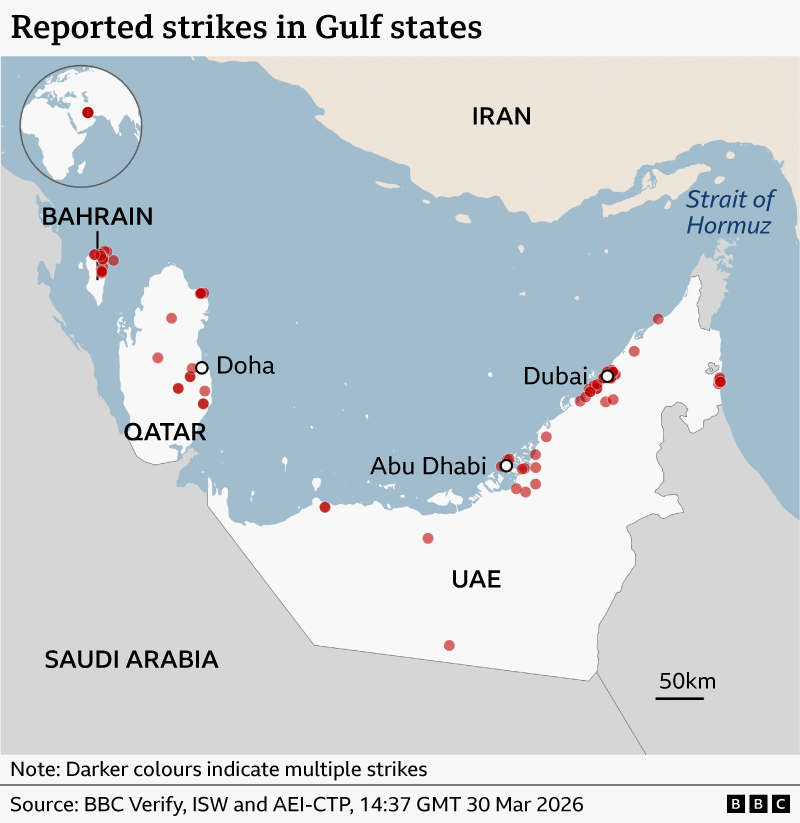 A map with red dots showing the location of Iranian strikes in Bahrain, Qatar and UAE.