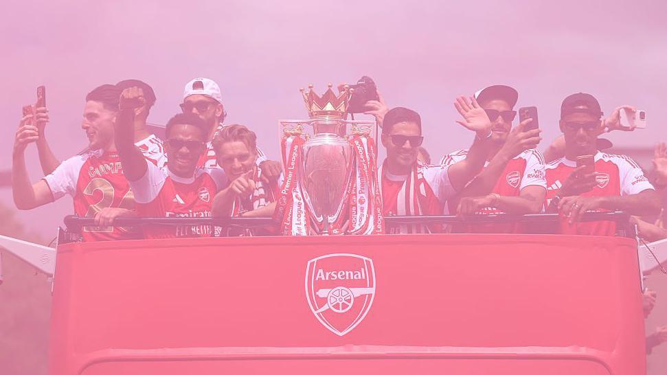 Thousands of fans watch on as Arsenal celebrates Premier League win with open-top bus parade