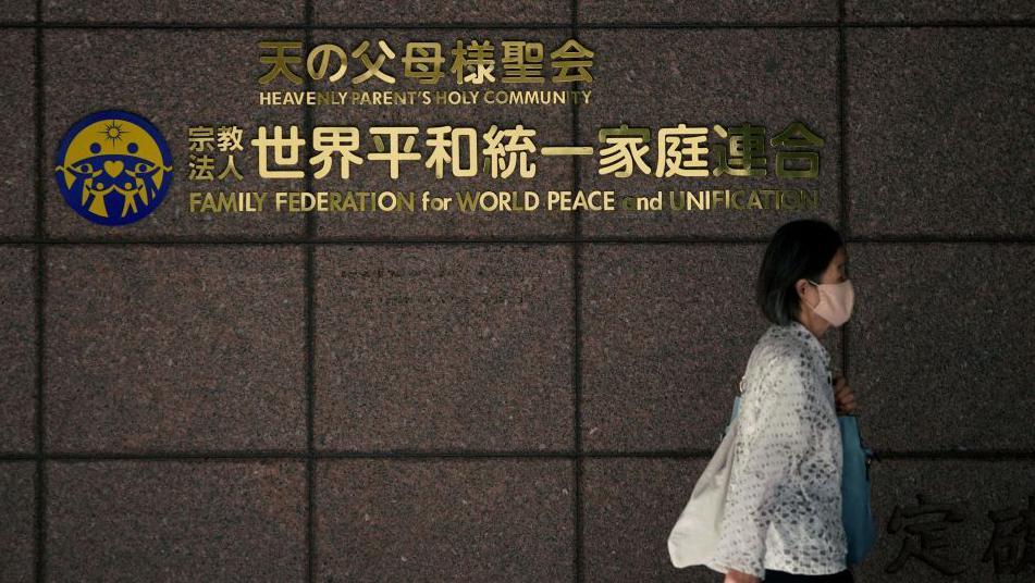 Japanese court upholds order to dissolve Unification Church
