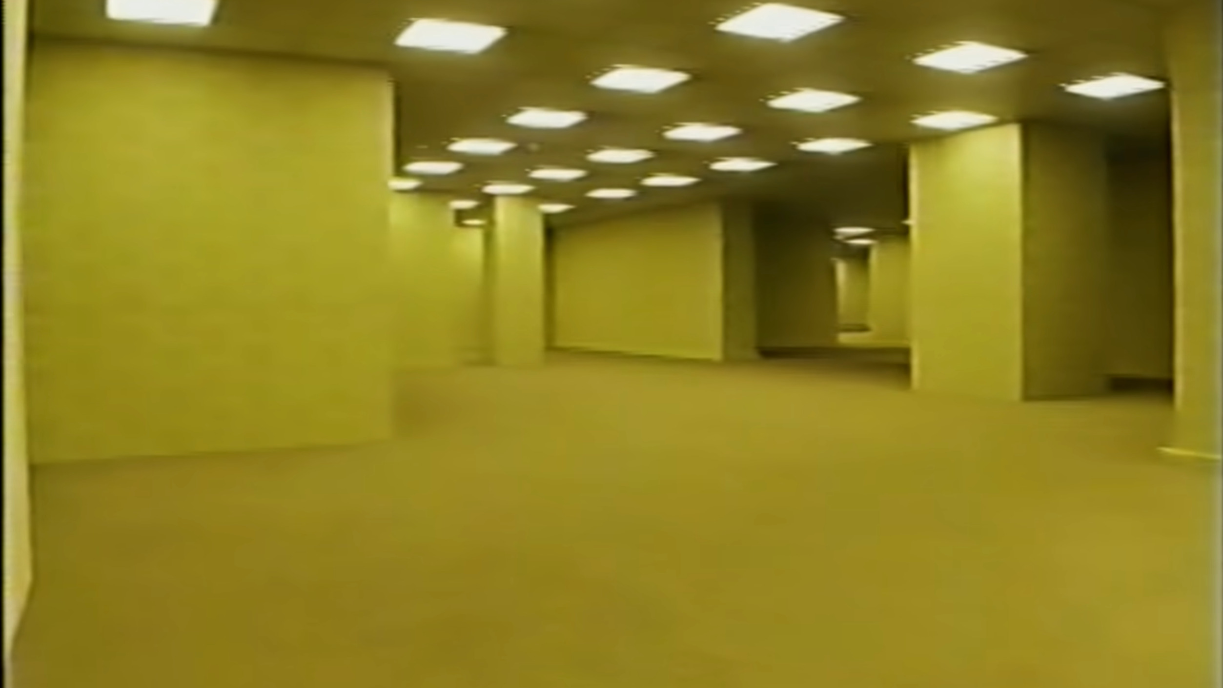 Un fotograma de los "Backrooms" generados por CGI que Parsons creó para su cortometraje original de YouTube.