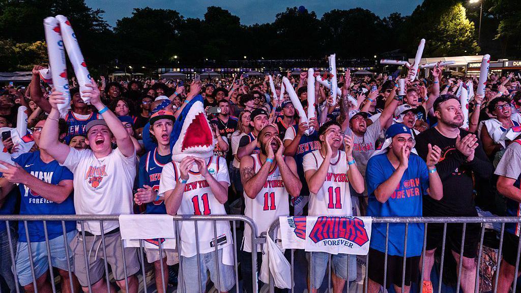 New Yorkers celebrate a thrilling possibility: The Knicks could soon be champions