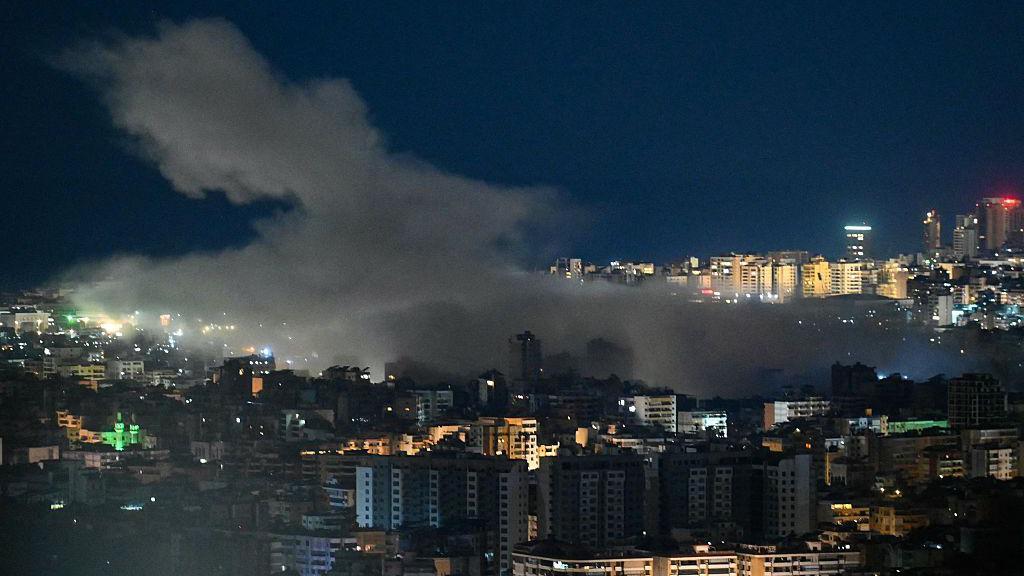 Israel and Iran launch new strikes as first UK flight bringing citizens home is delayed