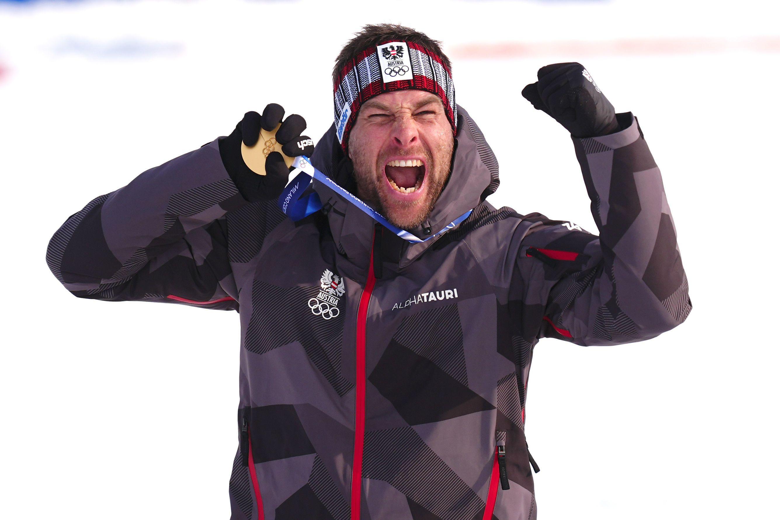 Benjamin Karl iz Austrije slavi osvajanje zlata u finalu paralelnog veleslaloma u muškoj konkurenciji protiv Sangkjuma Kima iz Južne Koreje, bord, zimske olimpijske igre u Italiji