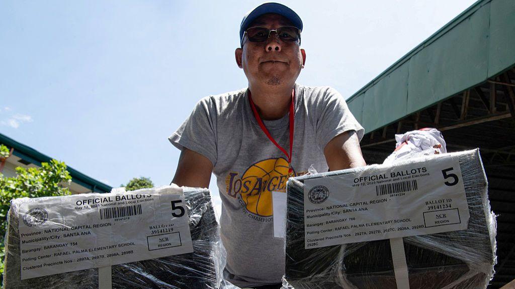 Millions vote in Philippines midterms as Marcos-Duterte feud heats up 