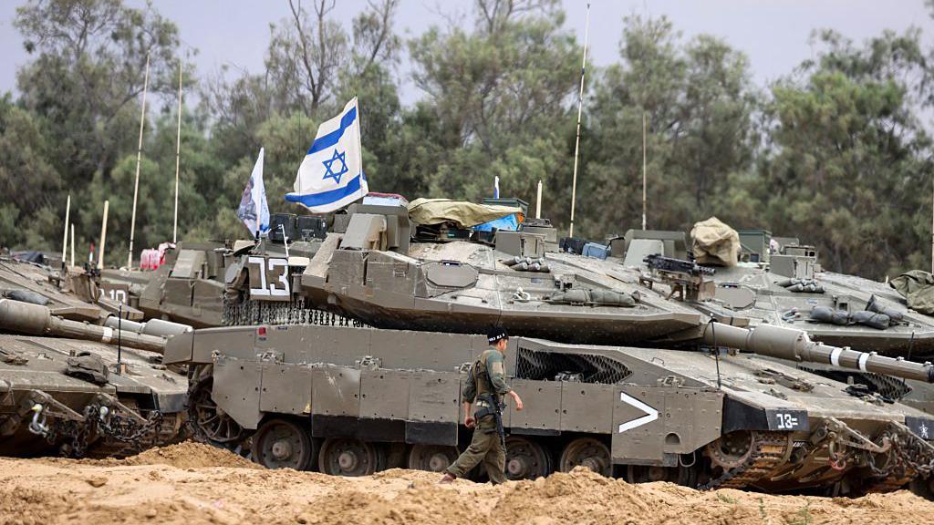 Israeli army starts calling up reservists for planned expansion to Gaza offensive