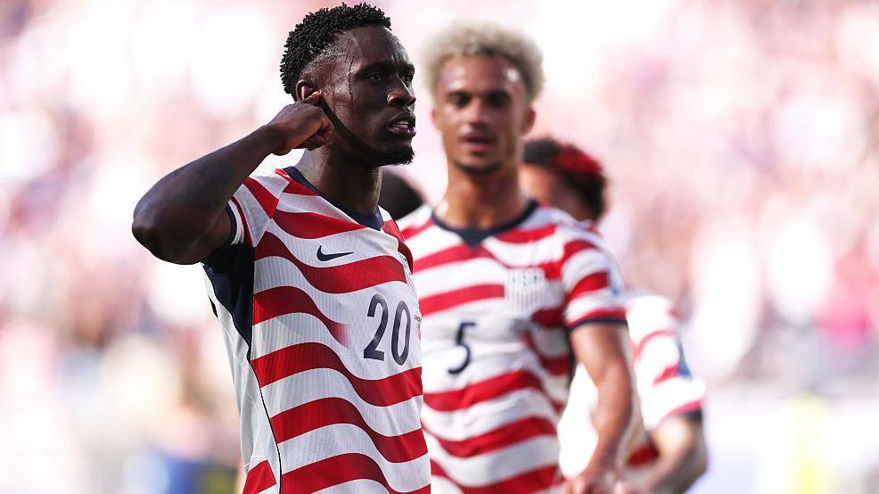 Balogun scores and is sent off as USA reach last 16