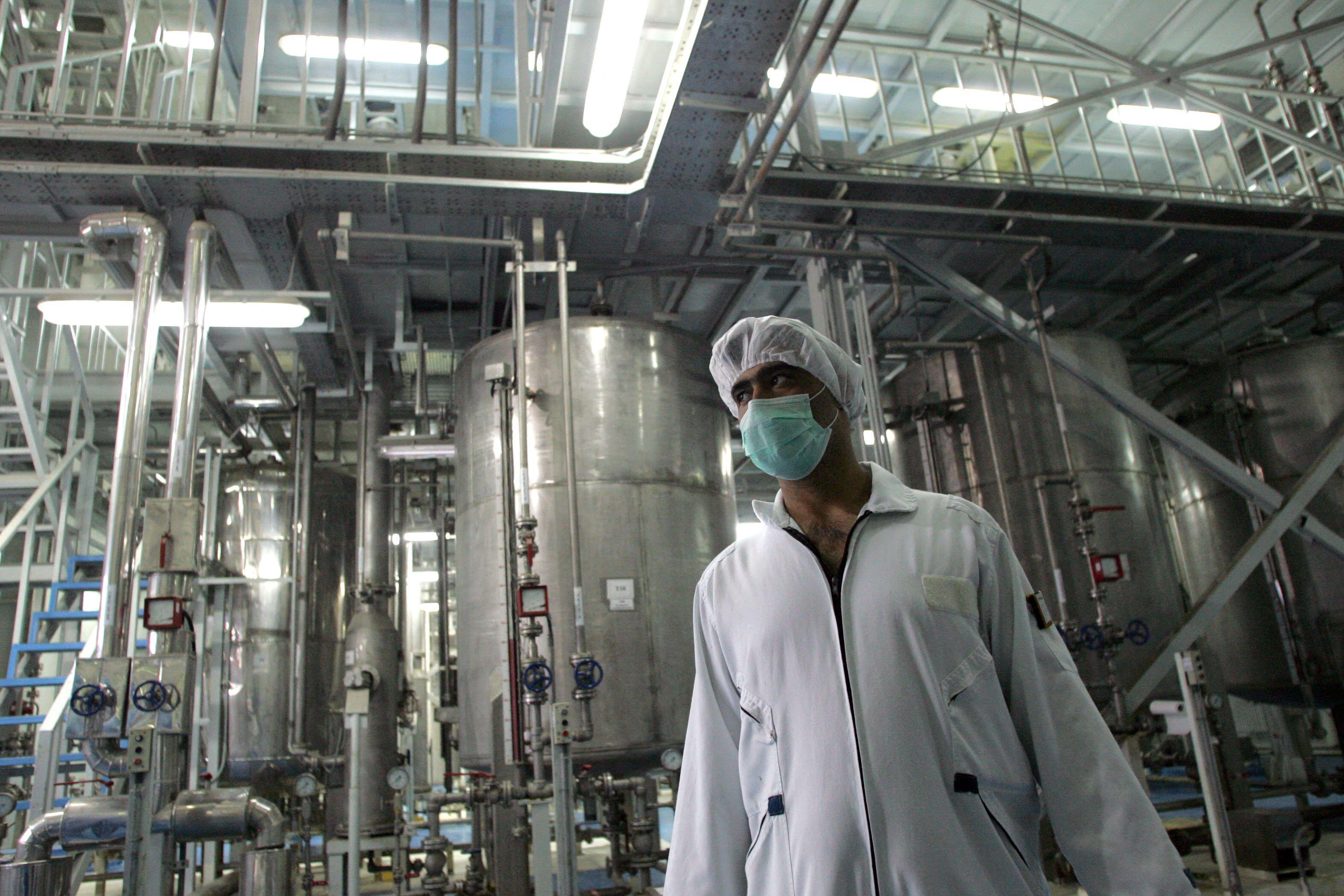 An Iranian technician works at the Isfahan Uranium Conversion Facilities, 3 February 2007