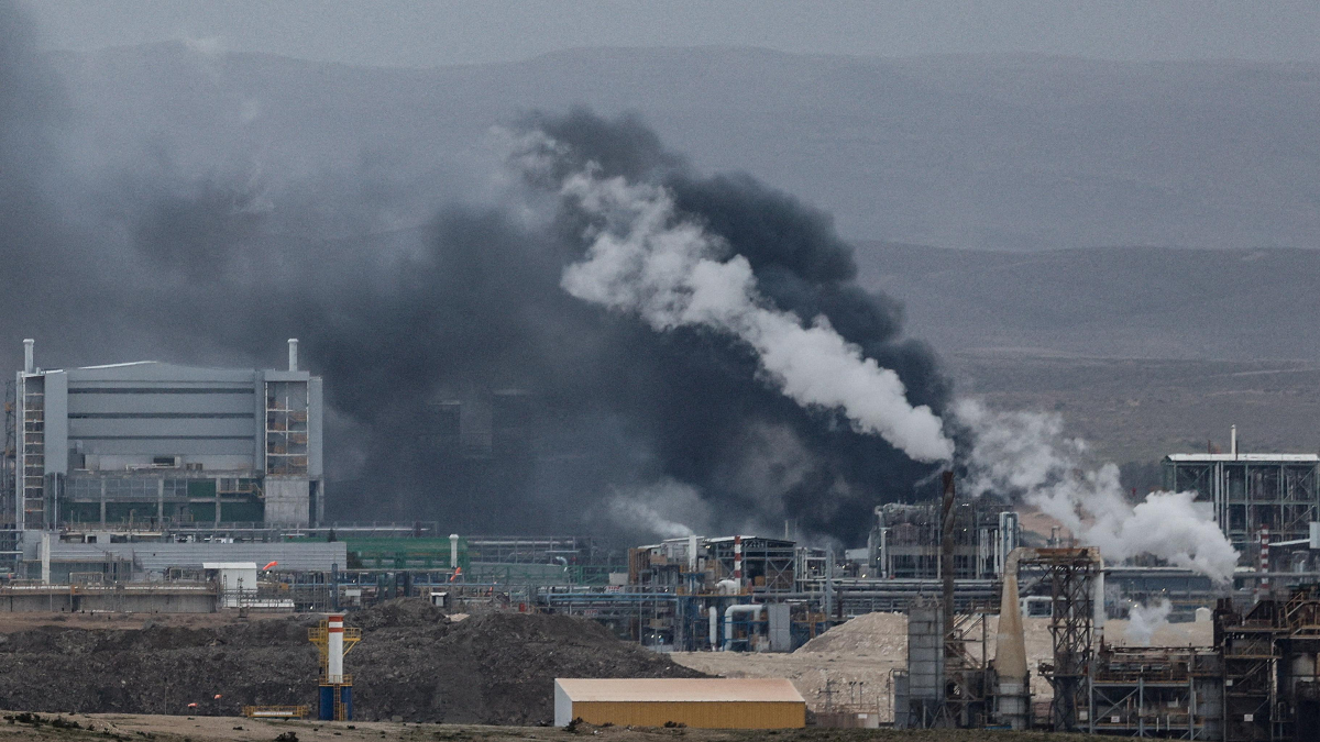 Israel says industrial site on fire after Iranian attack as hundreds mourn killed journalists in Lebanon