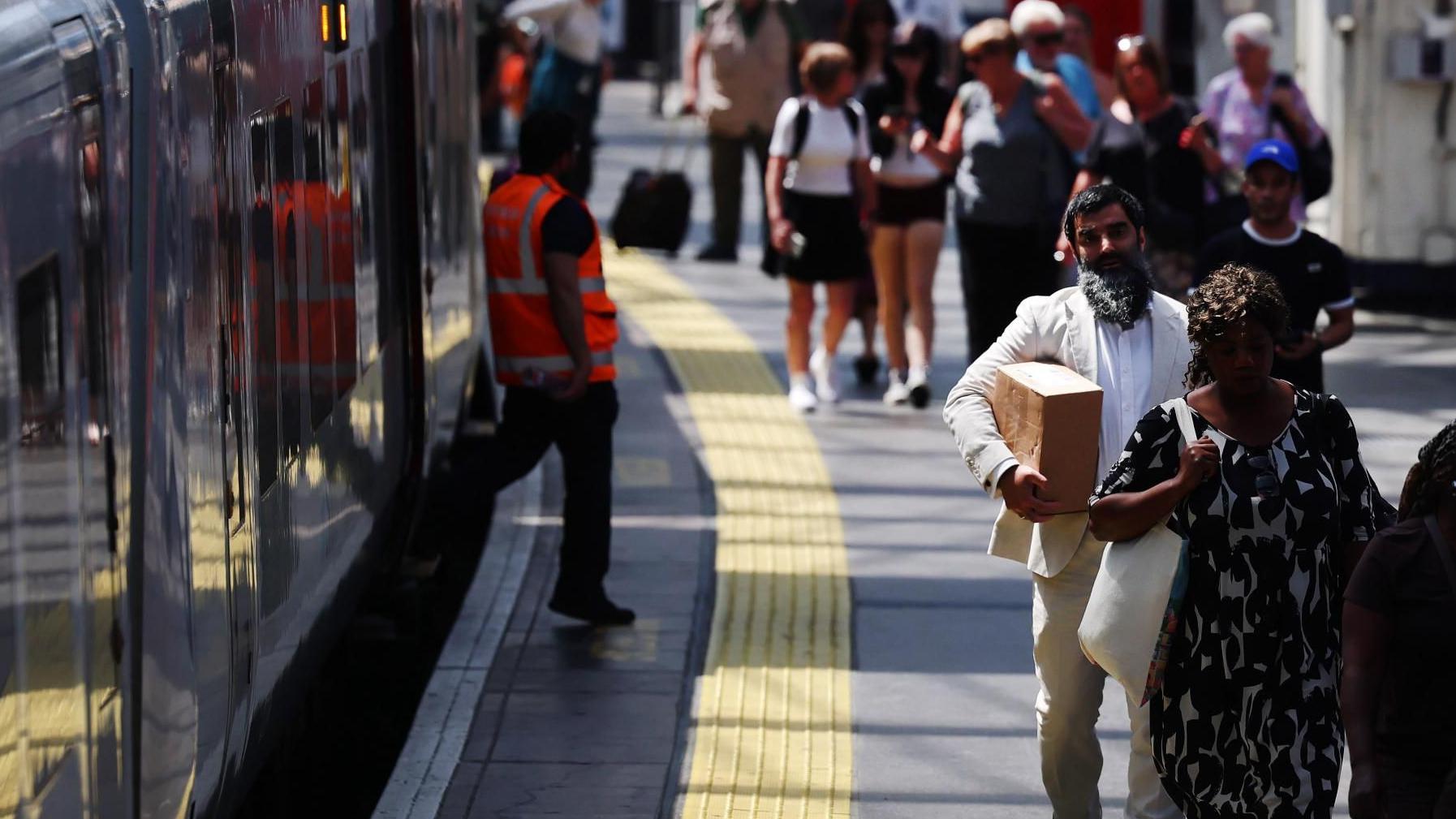 UK's biggest train operator warns against travel tomorrow as temperatures climb