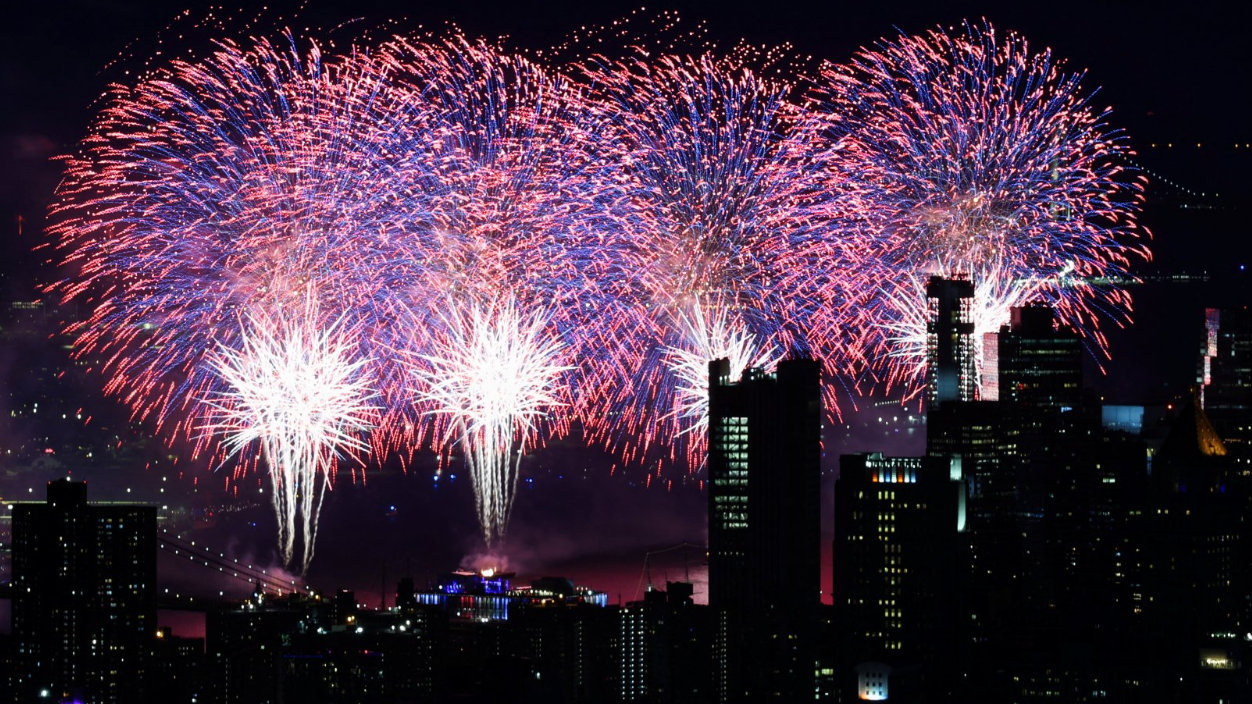 New York lights up with July 4th fireworks as Americans await delayed Trump speech