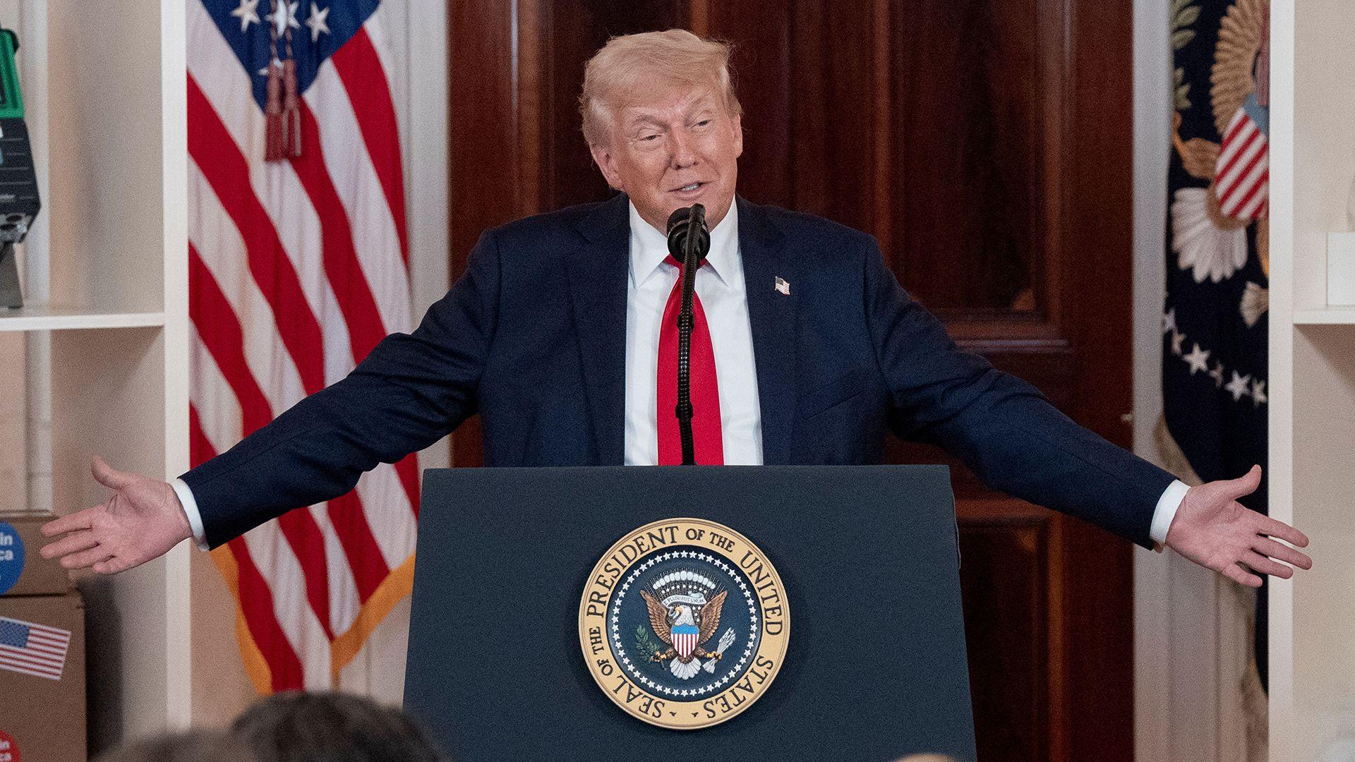Trump tells business chiefs he needs little bit of time as US economy shrinks