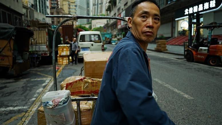 重慶街頭的打工者