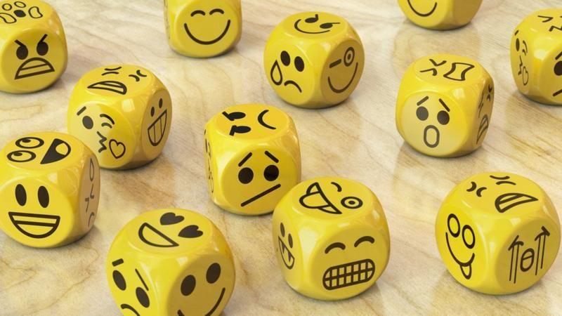  Dados com rostos de emo&ccedil;&otilde;es 