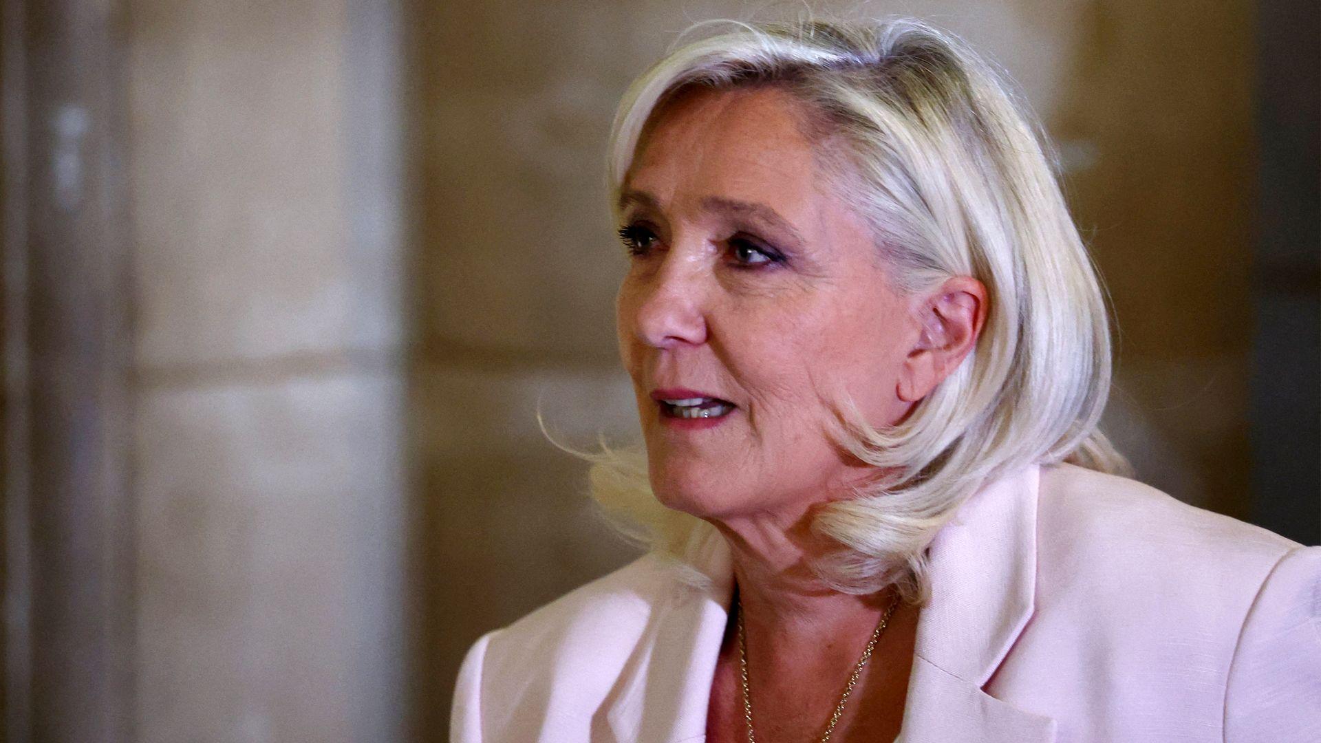 Le Pen at court to learn if she can run for French presidency as appeal judges rule on conviction