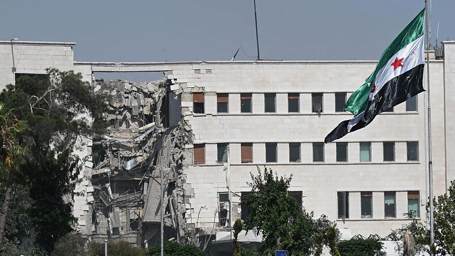 Fachada dañada de un edificio en Damasco