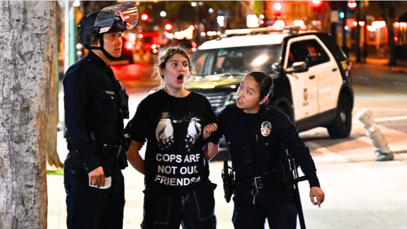 Mass arrests in LA as police enforce night-time curfew