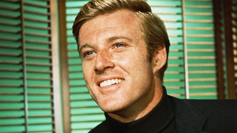 Robert Redford sonriendo.