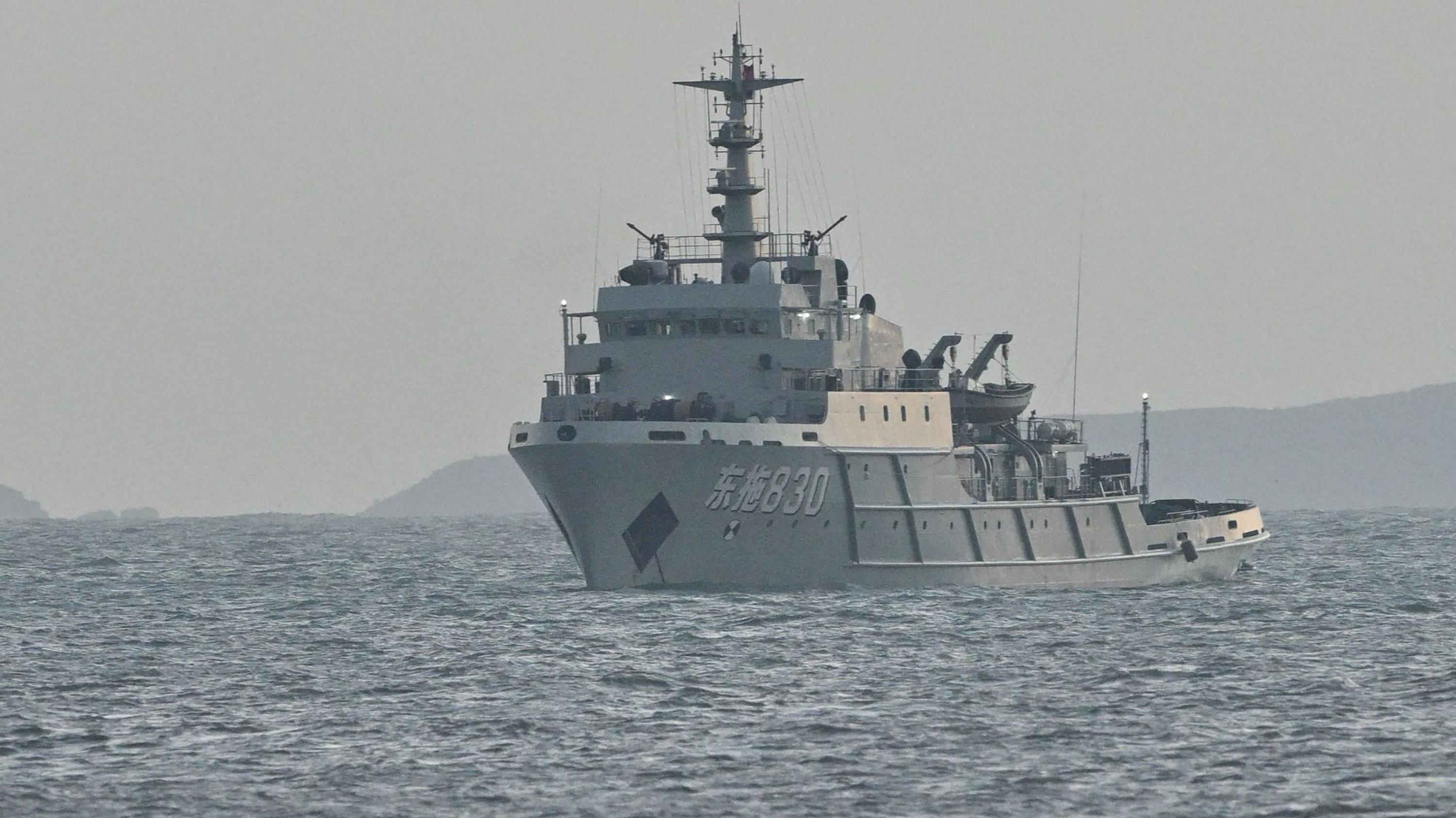 A Chinese ship is seen in waters near Pingtan island, the closest point to Taiwan, in eastern China's Fujian province on December 29, 2025. 