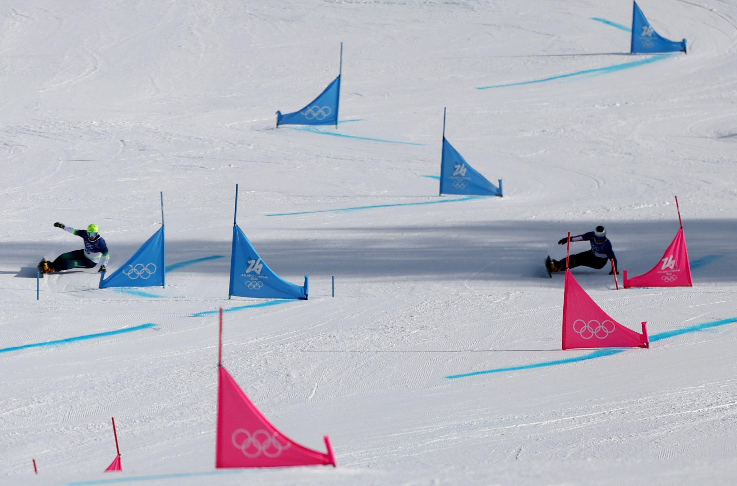 Benjamin Karl iz Austrije slavi osvajanje zlata u finalu paralelnog veleslaloma u muškoj konkurenciji protiv Sangkjuma Kima iz Južne Koreje, bord, zimske olimpijske igre u Italiji