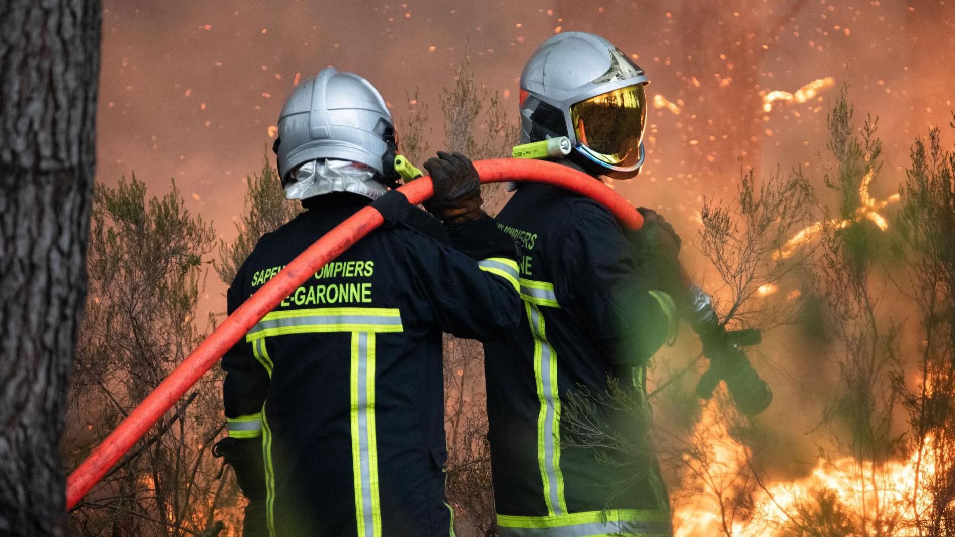 Wildfire threatens Bordeaux as more than 300,000 leave homes in France and Spain