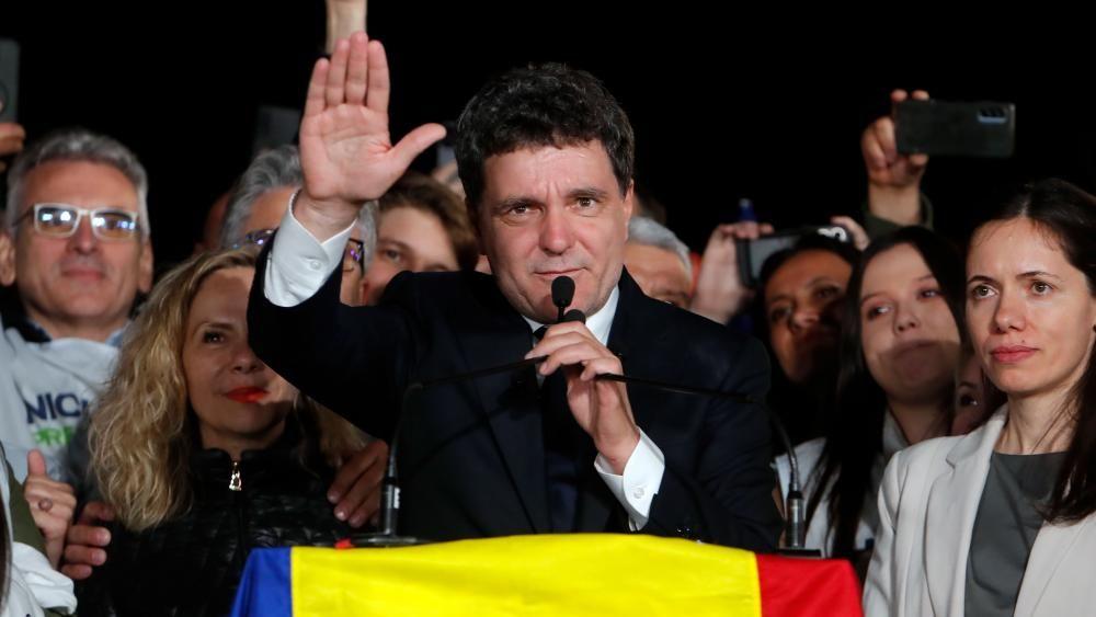 Huge challenges await new president of divided Romania