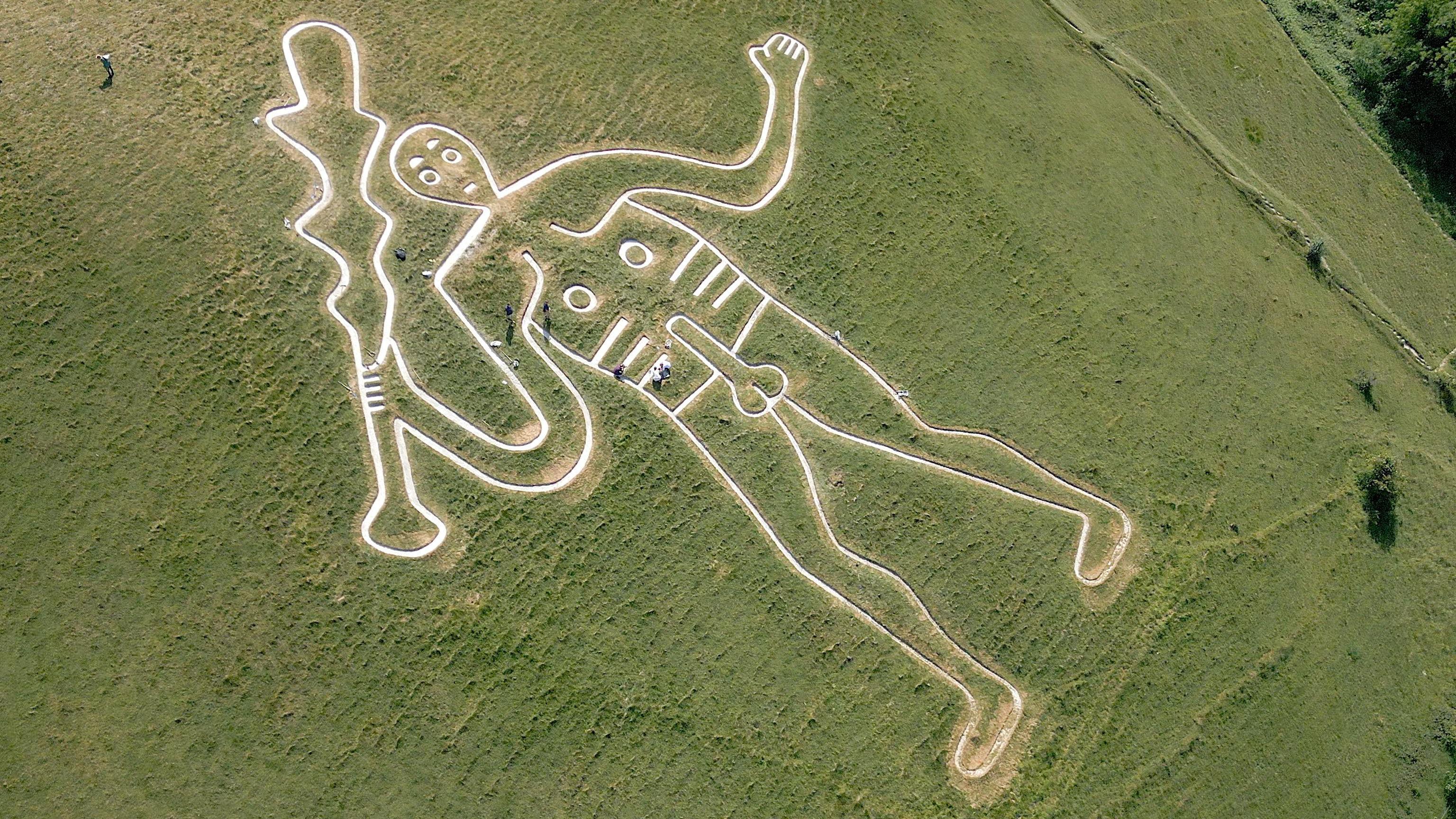 UKs rudest chalk figure gets a glow-up to stop it fading in the rain