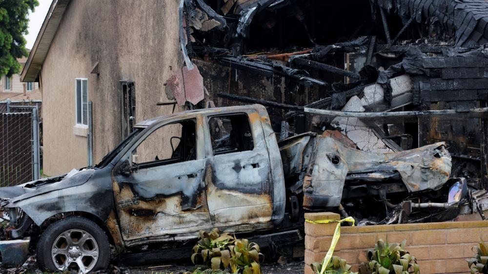 Two dead after private plane crashed into homes in San Diego, authorities say