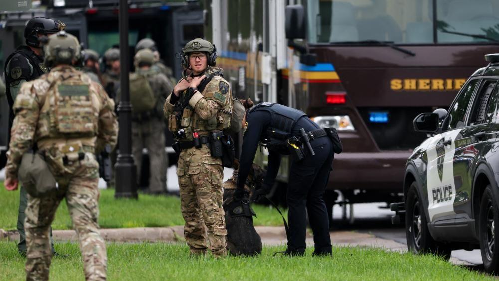 Minnesota police hunt for suspect in state politicians shooting death