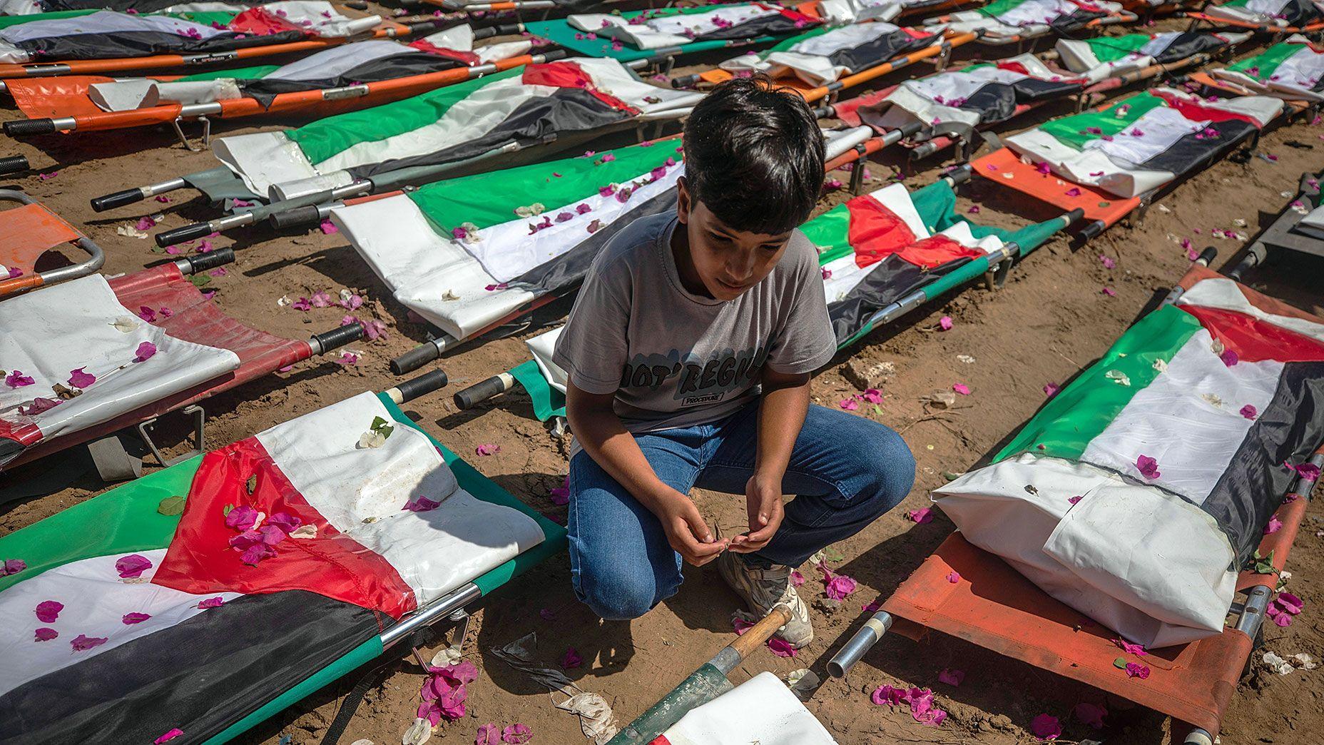 Mass funeral in Gaza for 112 Palestinians killed in 2023 Israeli strike