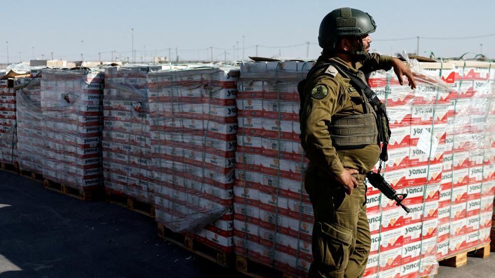Gaza air drops a grotesque distraction, aid agencies warn