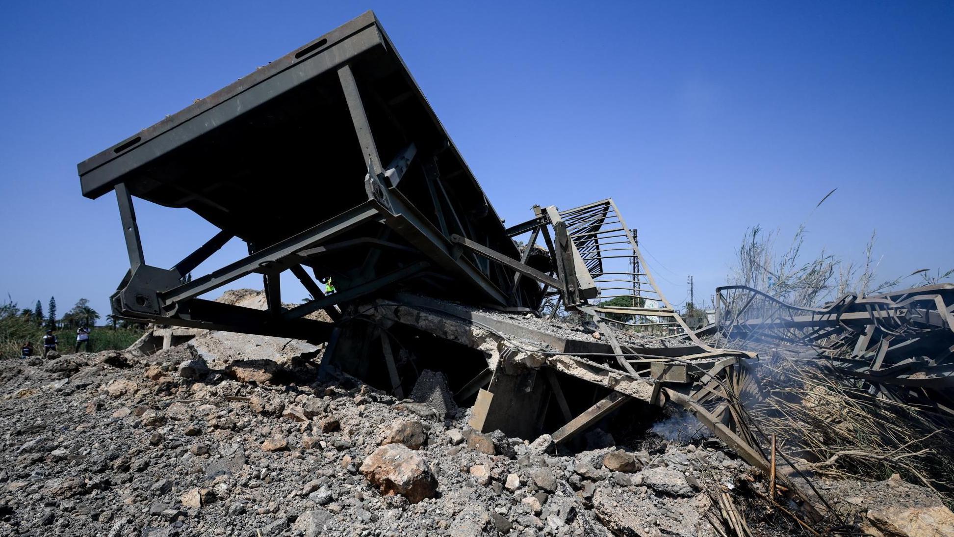 Israeli attacks destroy key bridge linking southern Lebanon with rest of country