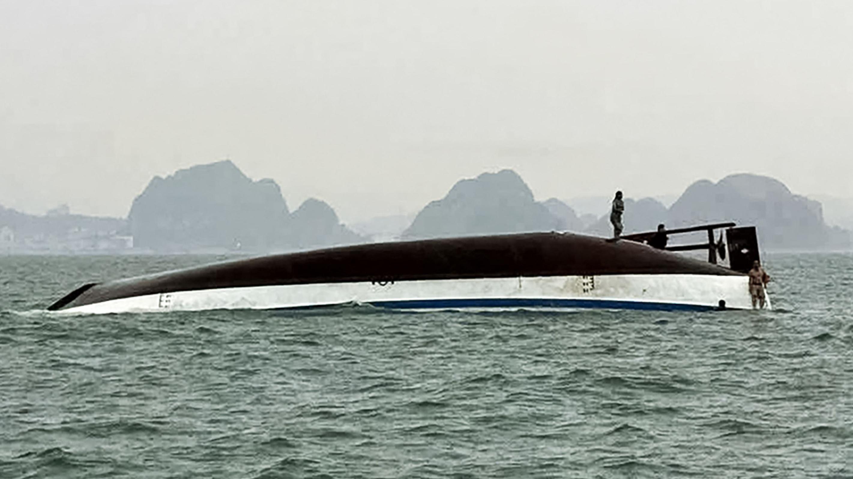 Dozens dead after Ha Long Bay tourist boat capsizes in Vietnam