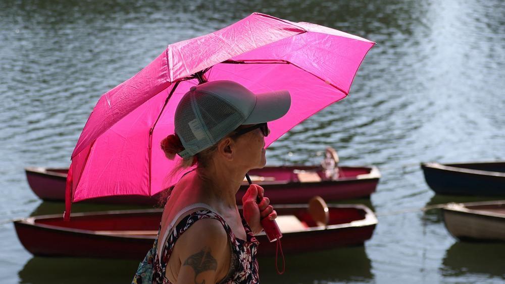 Red extreme weather warning in place for London and south-east England after record June heat