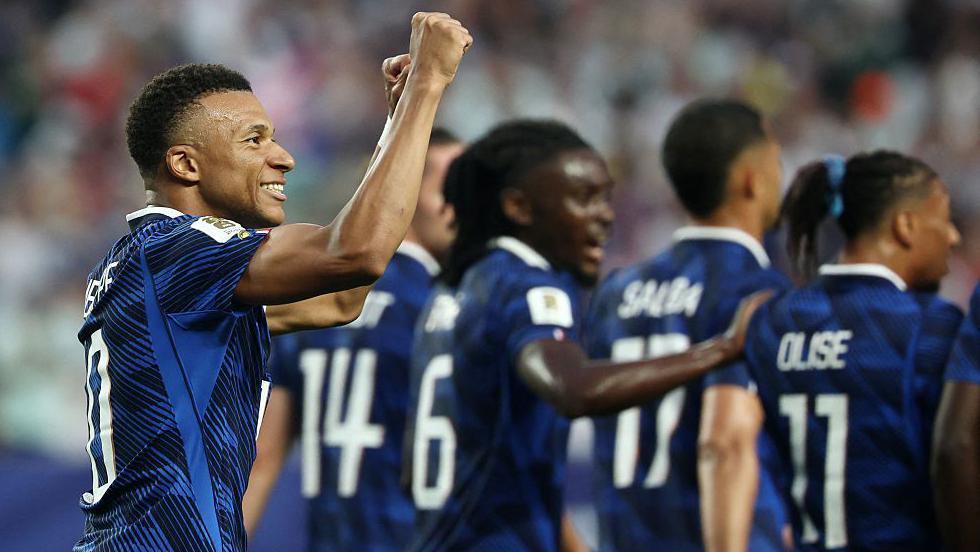 Mbappe doubles France lead over Iraq after two-hour delay