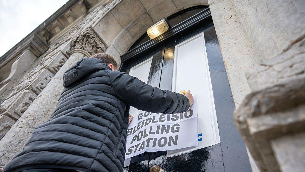 Voters heading to the polls in elections in England, Scotland and Wales