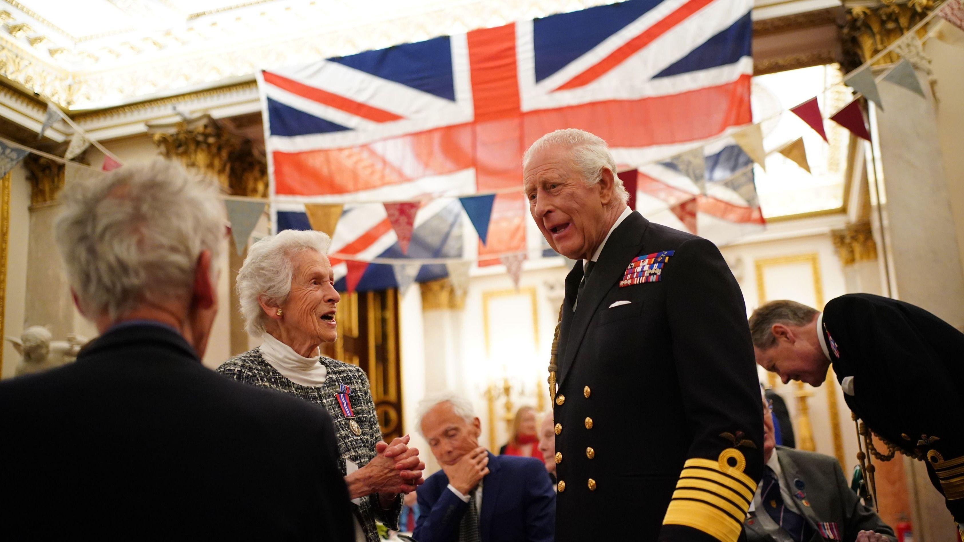 Buckingham Palace and Downing Street host VE Day tea parties after royals watch flypast