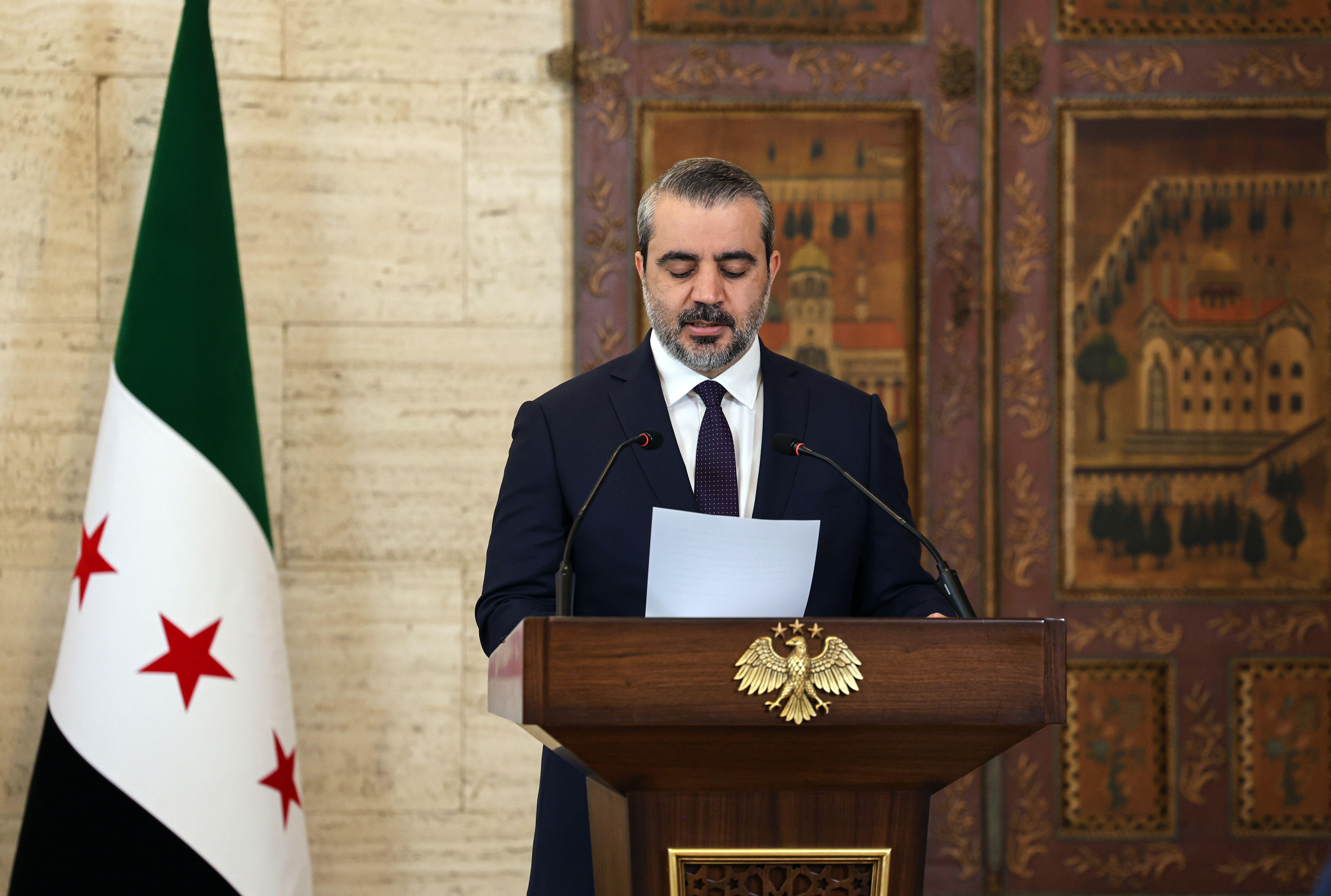 وزير الخارجية السوري أسعد الشيباني خلال مؤتمر صحفي مشترك مع المدير العام للوكالة الدولية للطاقة الذرية رافائيل غروسي في دمشق، في 18 أغسطس/آب 2026.
